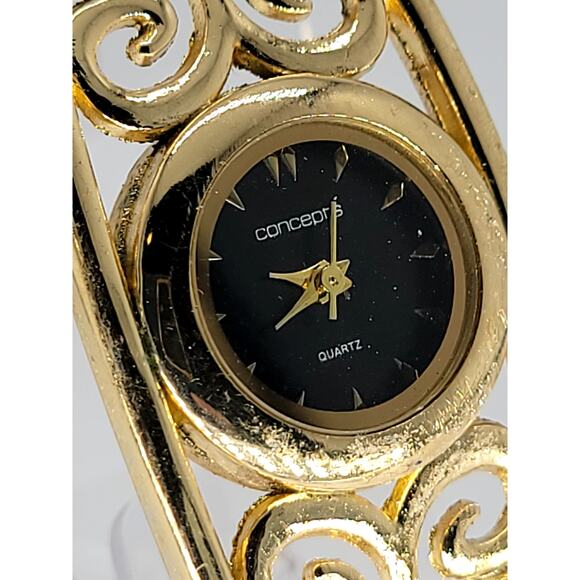 Vintage Concept Quartz Women’s Gold-Tone Filigree Cuff Bracelet Watch – Elegant